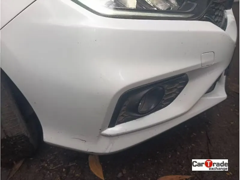 Minor Scratches on the front right bumper corner