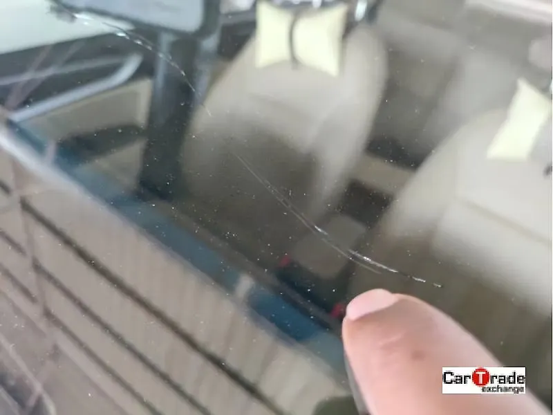 Cracks on the front wind shield glass Cracks on the front wind shield glass