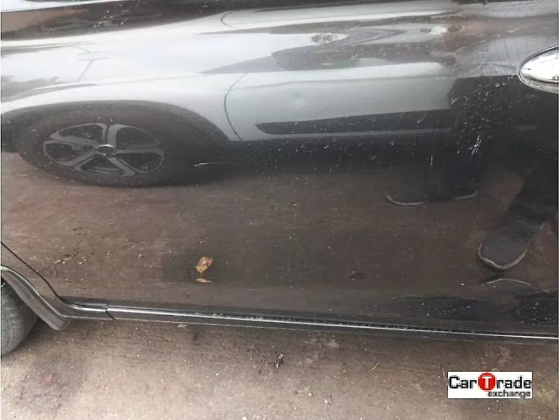 Minor Scratches on the front left door Minor Scratches on the front left door