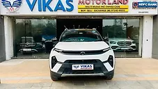 Used Tata Nexon Fearless Plus (S) 1.2 Petrol 7DCA Dual Tone [2023-2025] in Ahmedabad