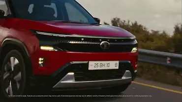 Tata Sierra Teased in Red Shade, Confirms Triple-Screen Dashboard