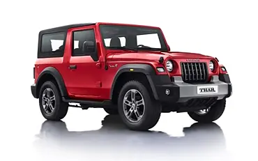 Compare Jeep Wrangler vs Audi Q5 vs Mahindra Thar