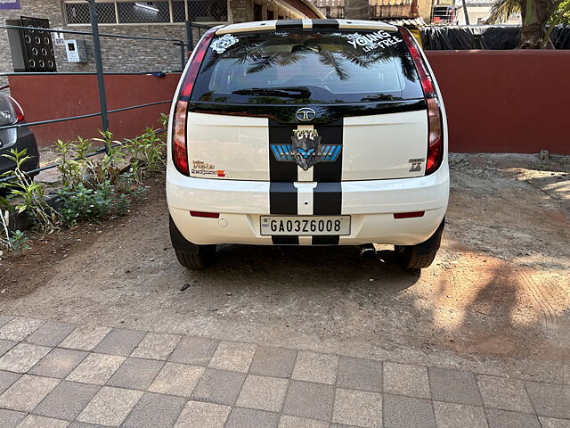 Old Suzuki with Ferrari sticker parked on street in Panaji, Goa