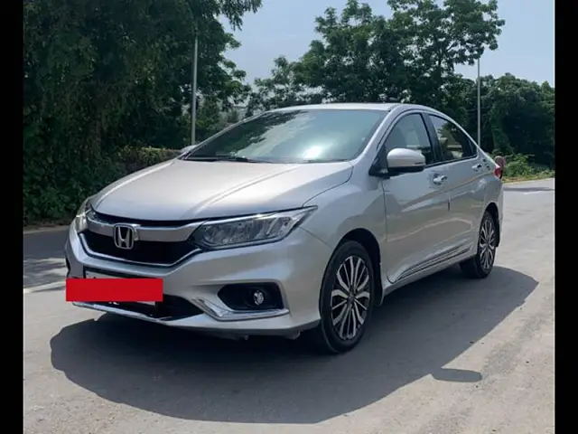 Second Hand 2018 Honda City 4th Generation ZX CVT Petrol for sale at Rs. 9,90,000 in Ahmedabad. Second Hand 2018 Honda City 4th Generation ZX CVT Petrol for sale at Rs. 9,90,000 in Ahmedabad.