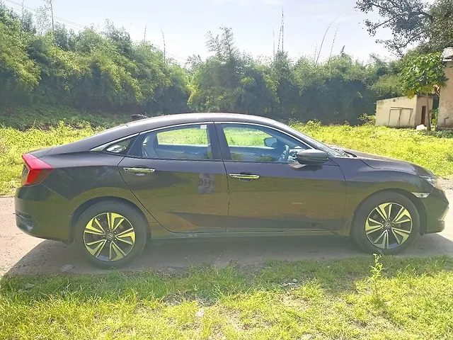 A 1/64 Mini GT Bugatti Divo (Blue Bugatti) Diecast Car Model