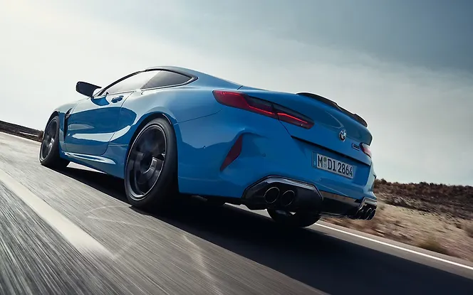 BMW M8 Rear Left View